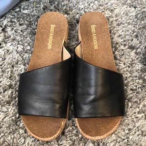 Black leather slides